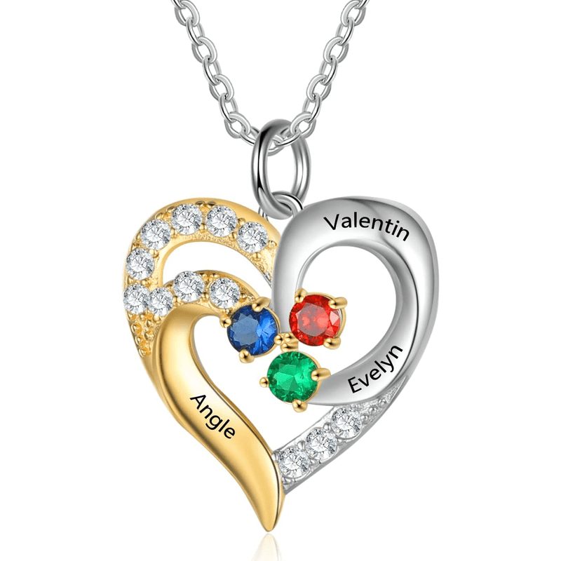 Two-tone heart pendant necklace with gold and silver swirls, diamonds, and three colored gems; engraved names Valentin and Evelyn along the curves.