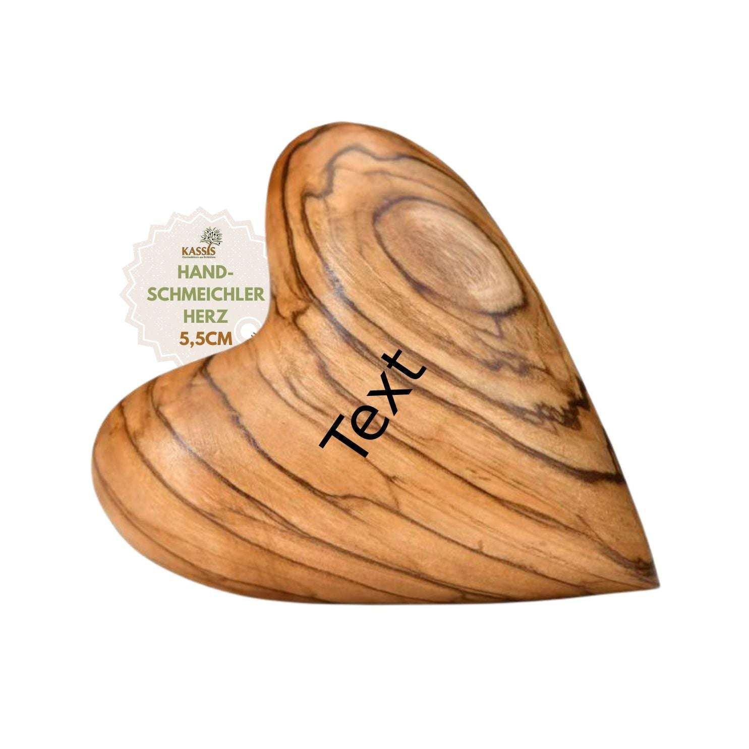 Wooden heart with a natural wood grain finish and a beige badge reading 'HAND-SCHMEICHLER HERZ 5,5CM' (KASSIS logo).