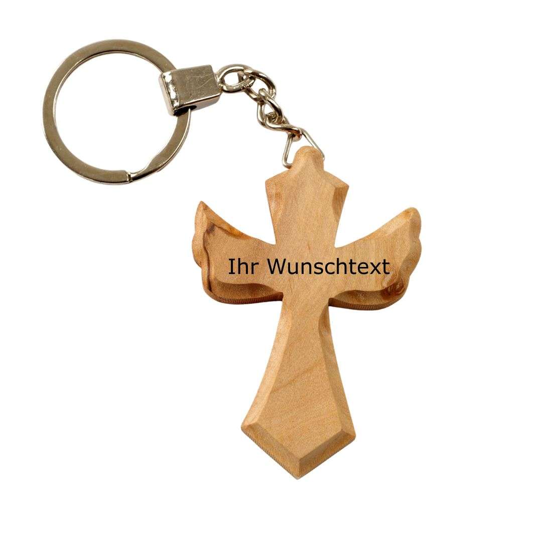 Wooden cross-shaped keychain with a metal ring and placeholder text 'Ihr Wunschtext' for custom engraving (decorative accessory).