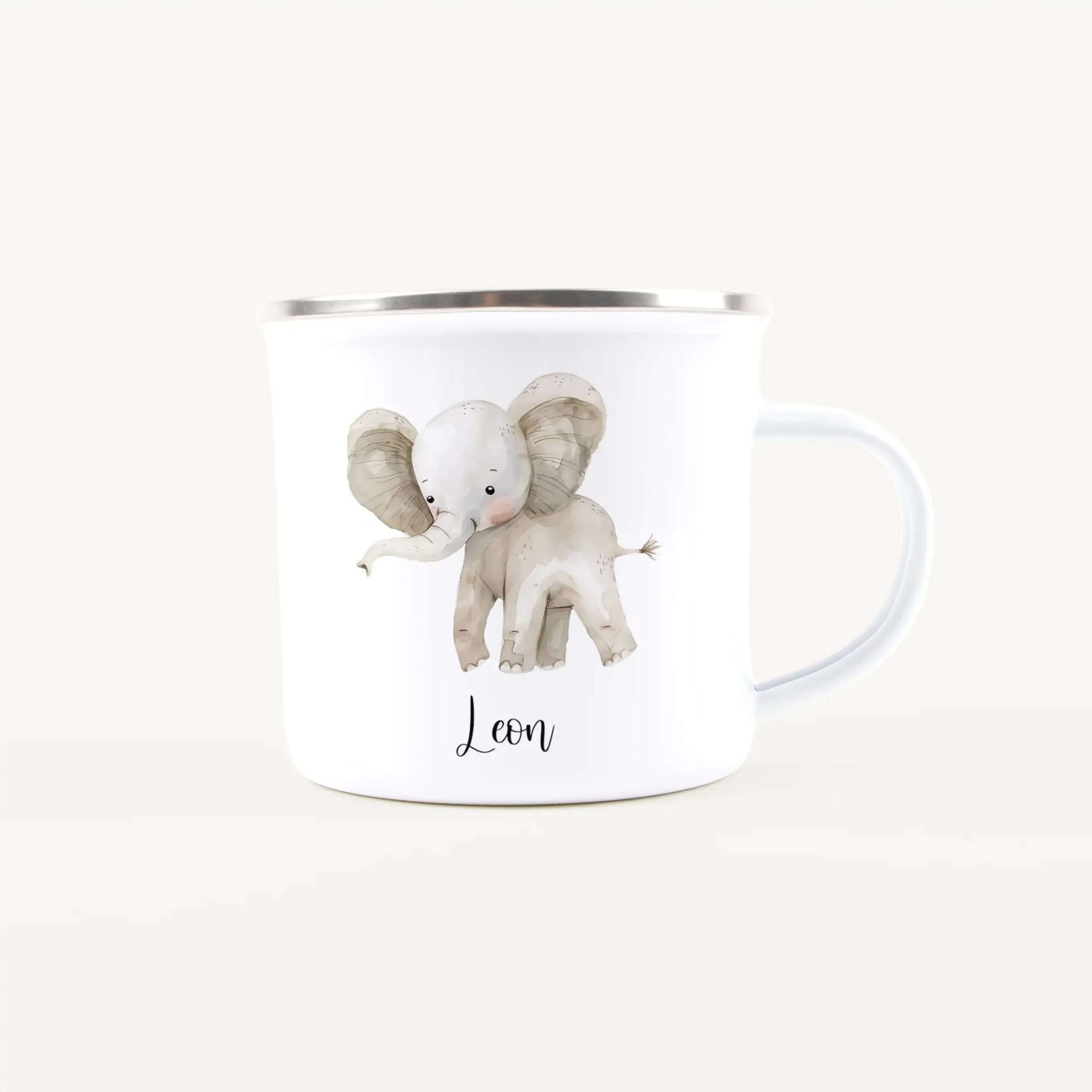 White mug with a silver rim displaying a watercolor elephant illustration and the name 'Leon' on the front