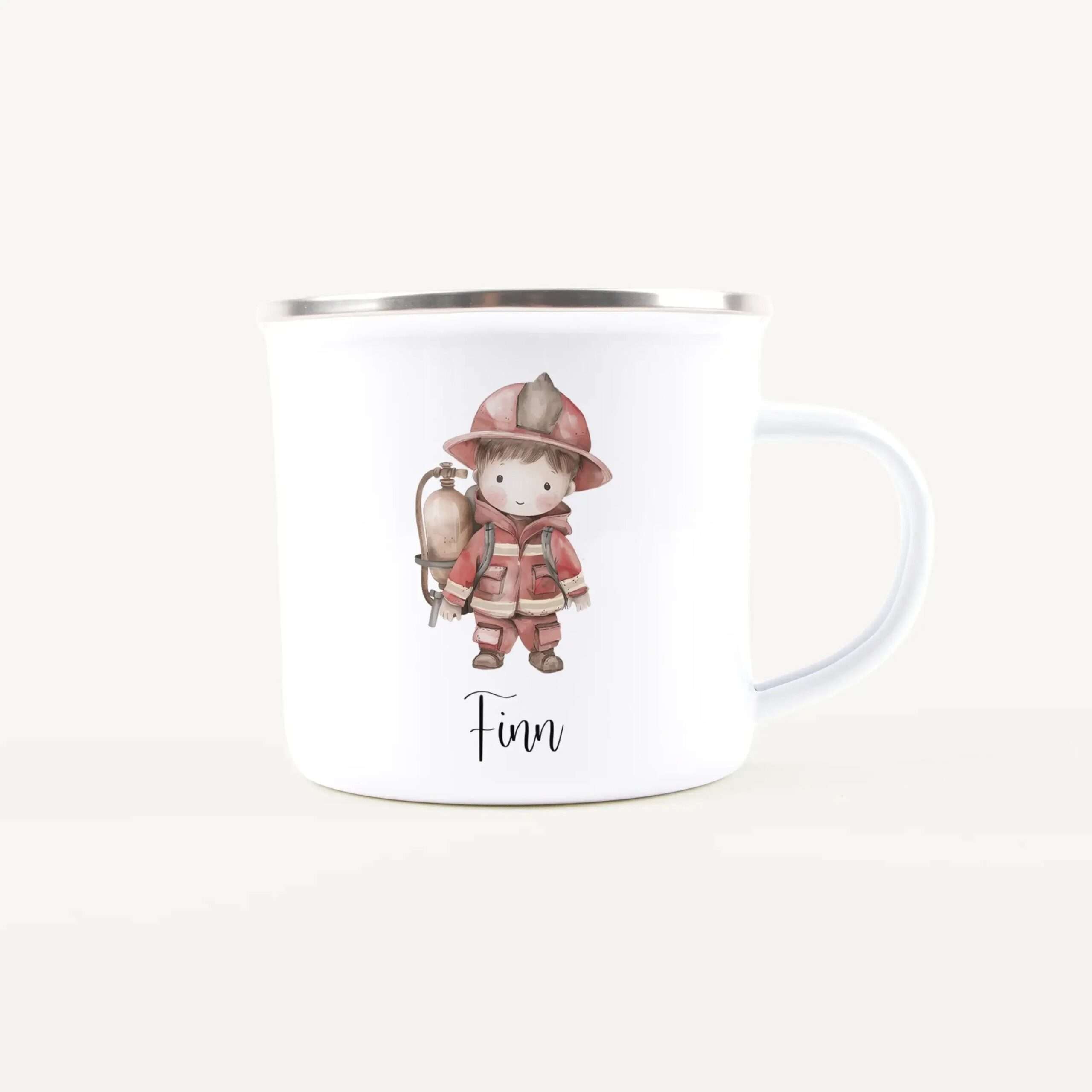 White ceramic mug with a cute illustration of a young firefighter girl in red uniform and helmet, holding a hose.