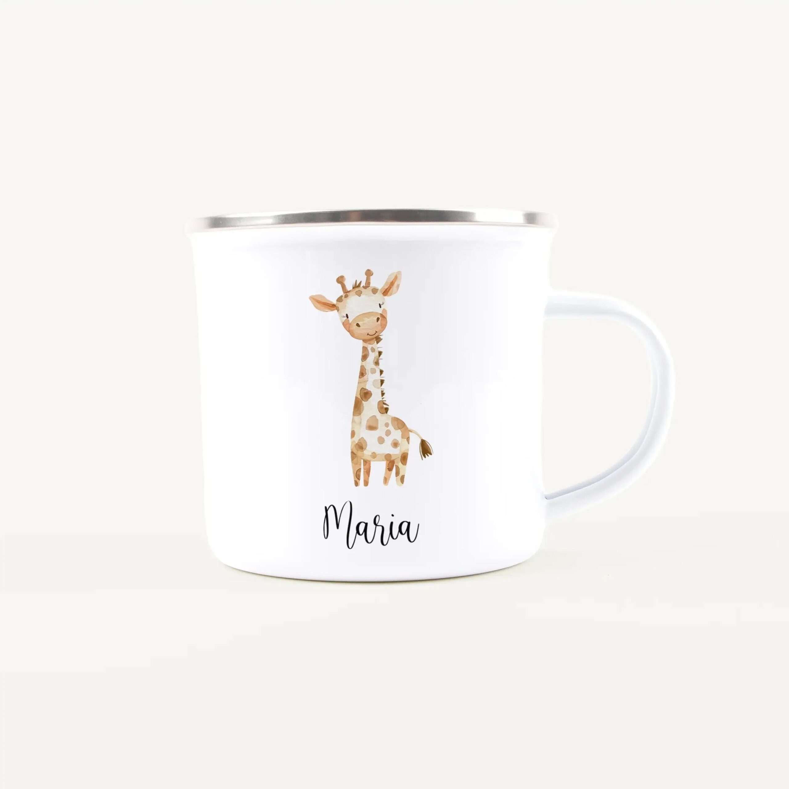 White ceramic mug with a silver rim, featuring a cute giraffe illustration and the name Maria printed on the side