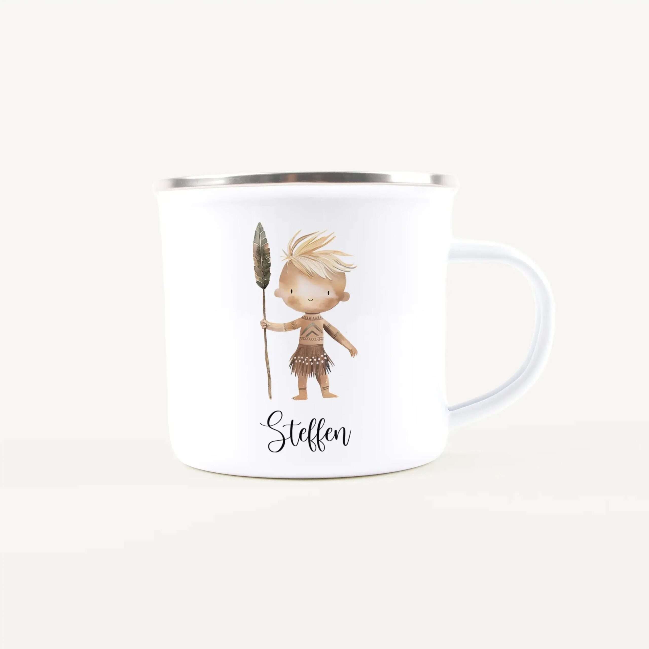White ceramic mug with a cartoon baby in a tribal-inspired outfit holding a spear and feather headdress, and the name 'Stellen' in script.