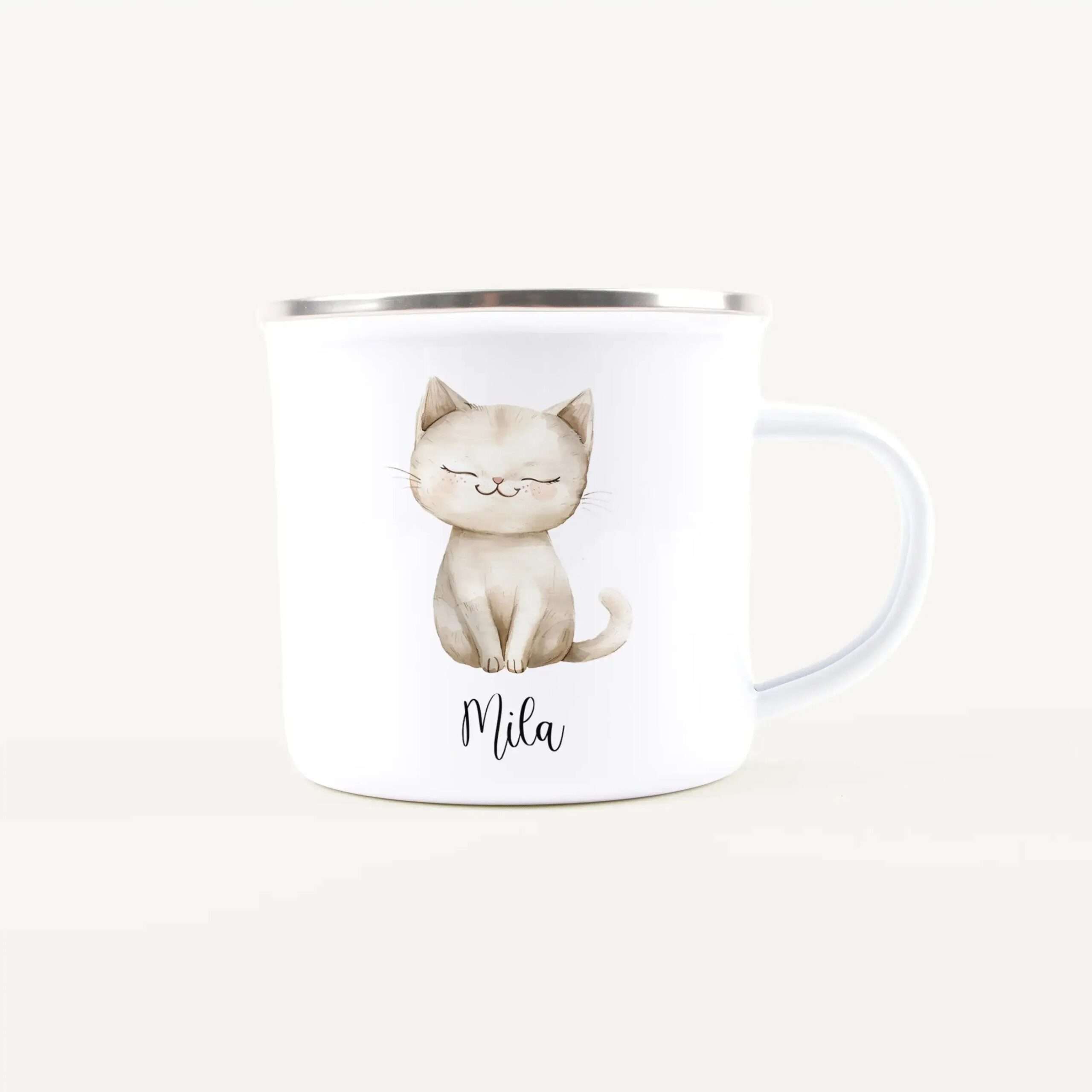 White mug with a watercolor cat illustration and the name Mila printed on it, visible on the side.