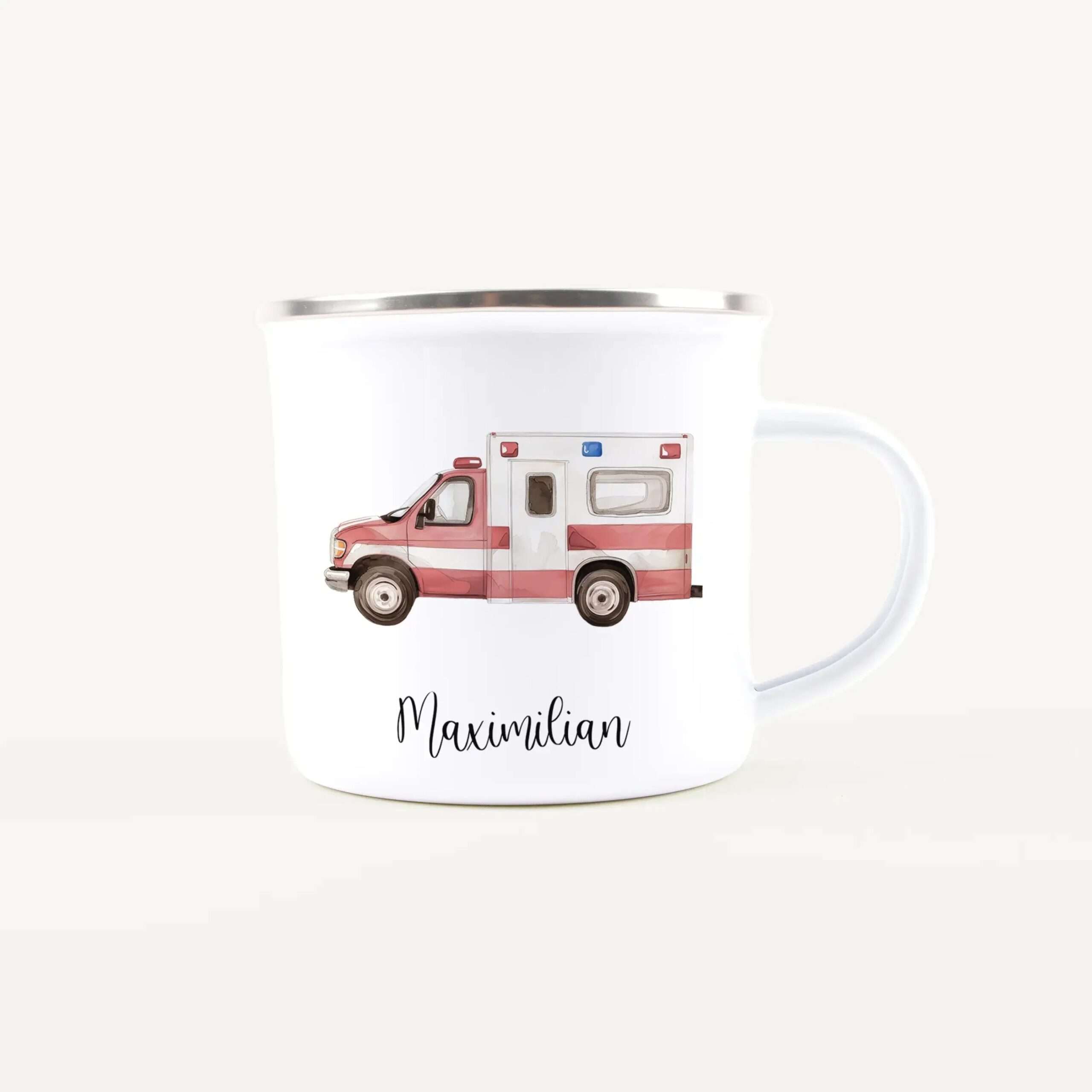 White mug featuring a red ambulance illustration and the name Maximilian in script lettering on the front