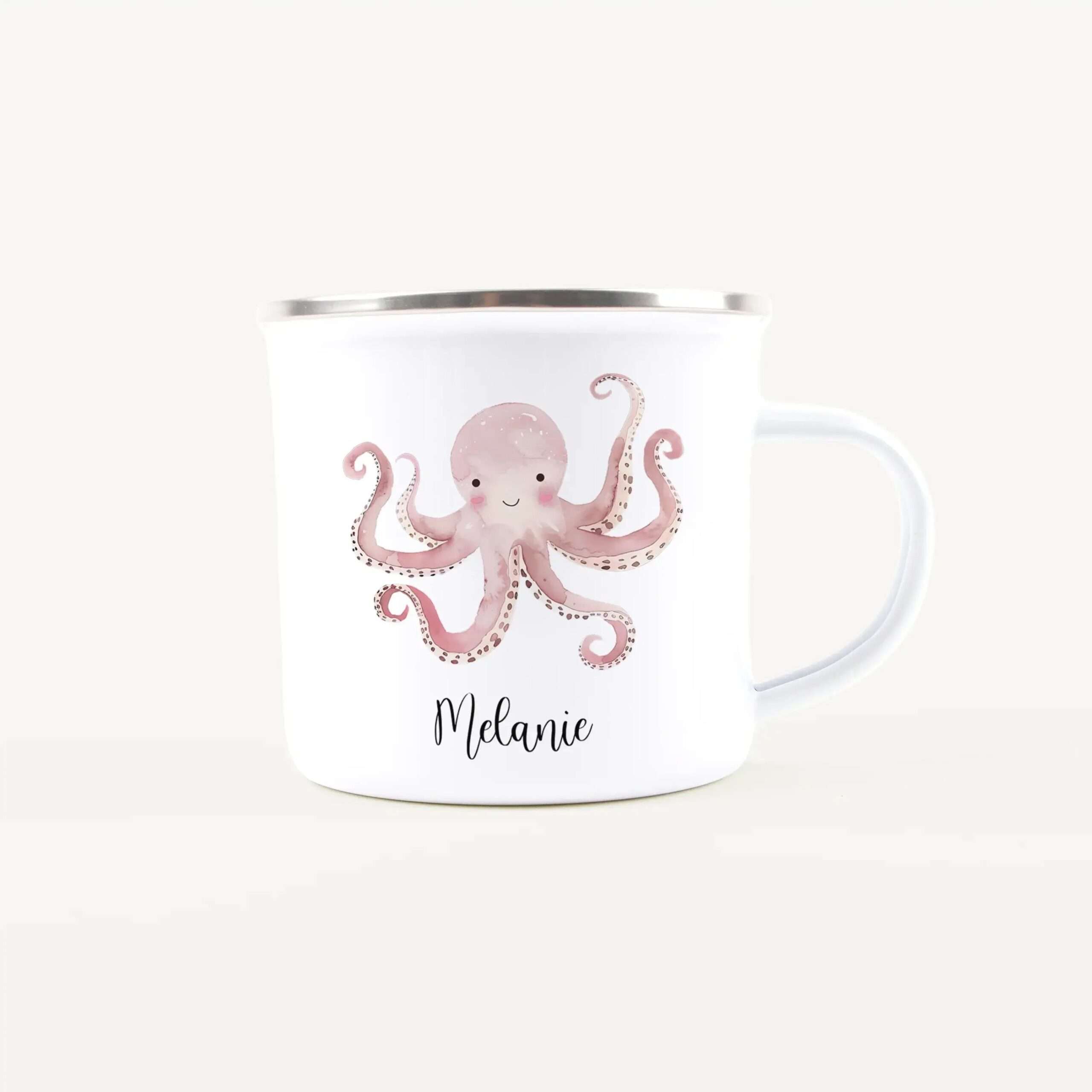 White mug with pink octopus illustration and the name Melanie printed below, shown against a light background.