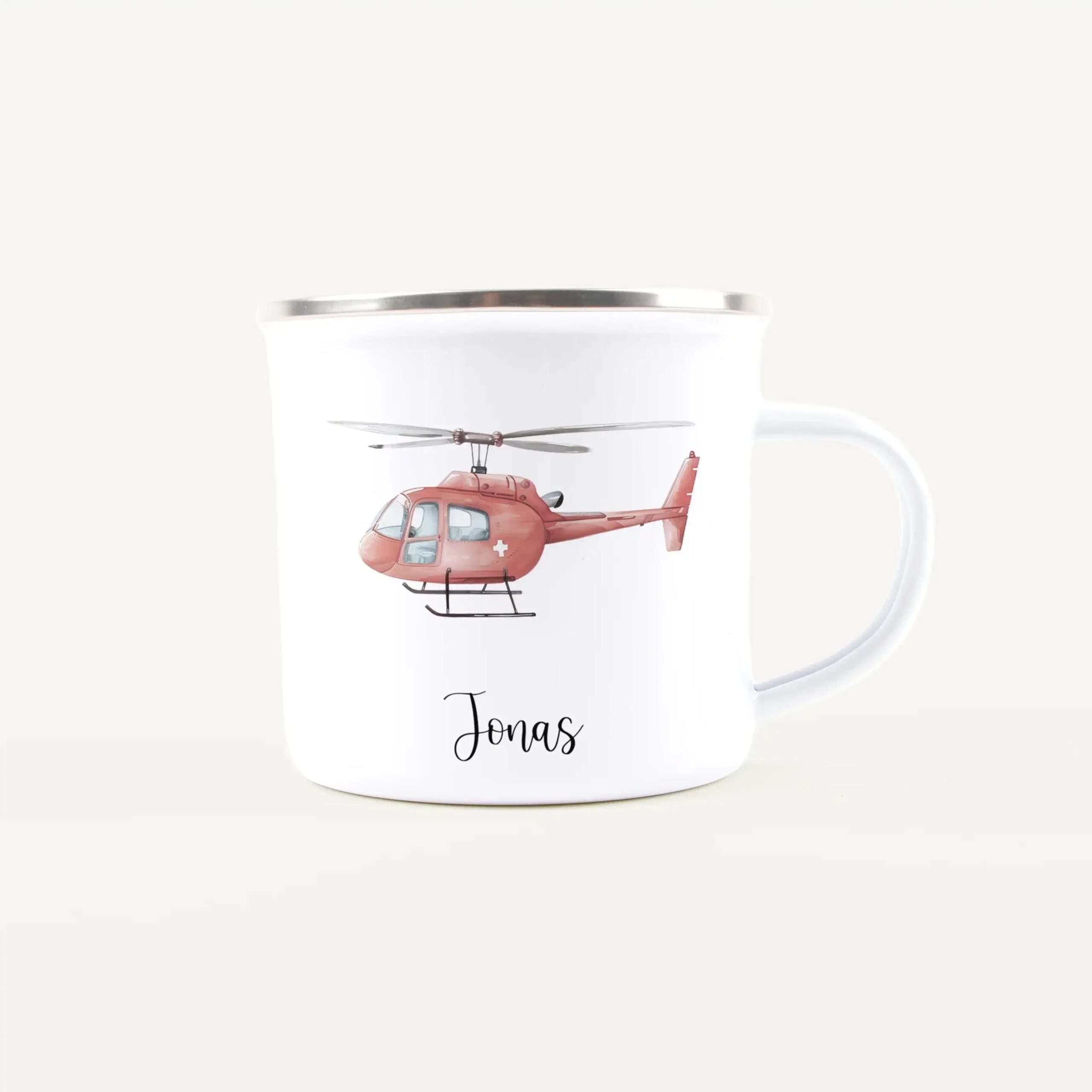 White ceramic mug with a red helicopter illustration and the name Jonas in script next to the handle.