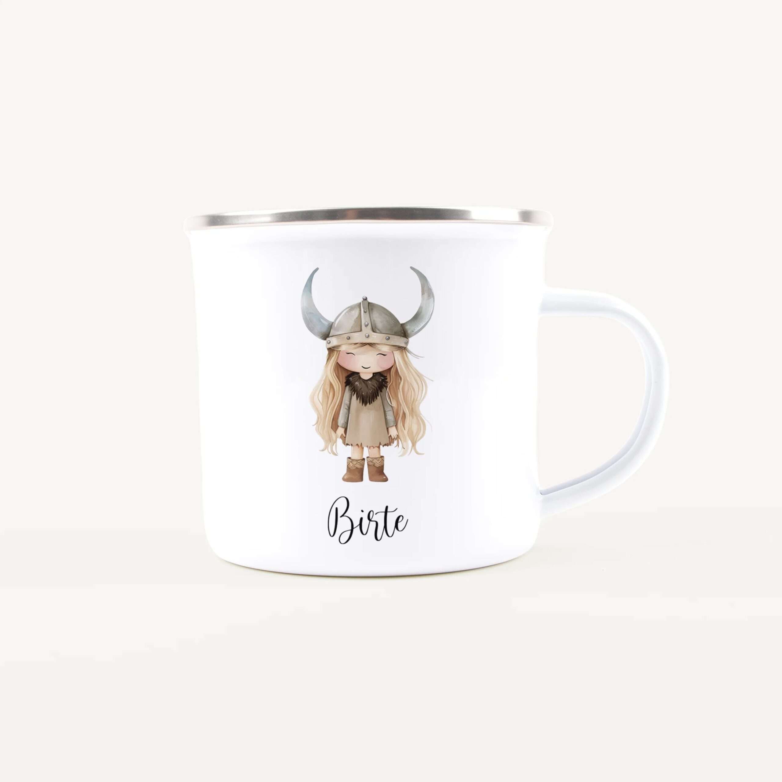 White mug featuring a cartoon Viking girl with a horned helmet and blonde hair, shown from the front (partial view).