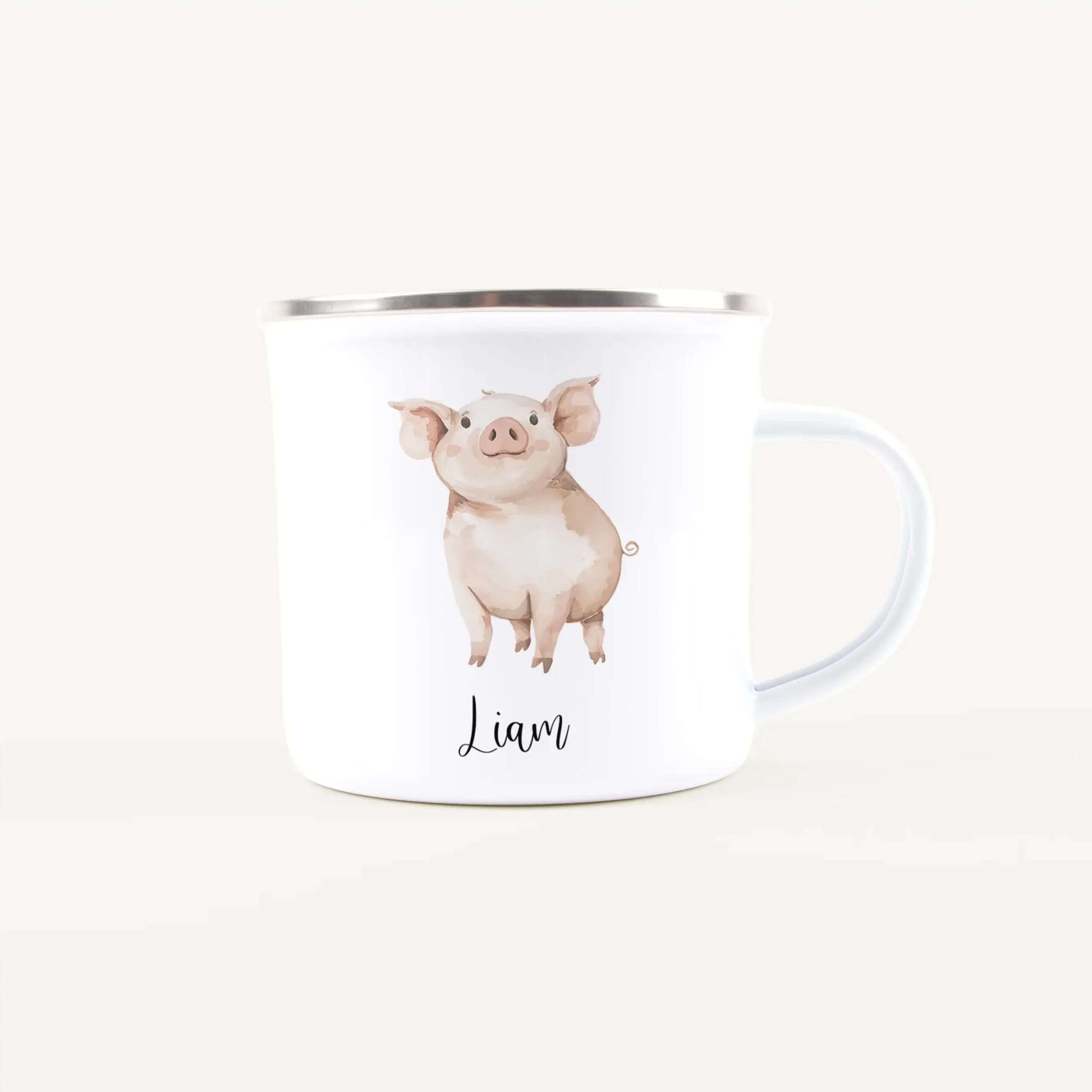 White ceramic mug featuring a cute pig illustration and the handwritten name Liam on the front.