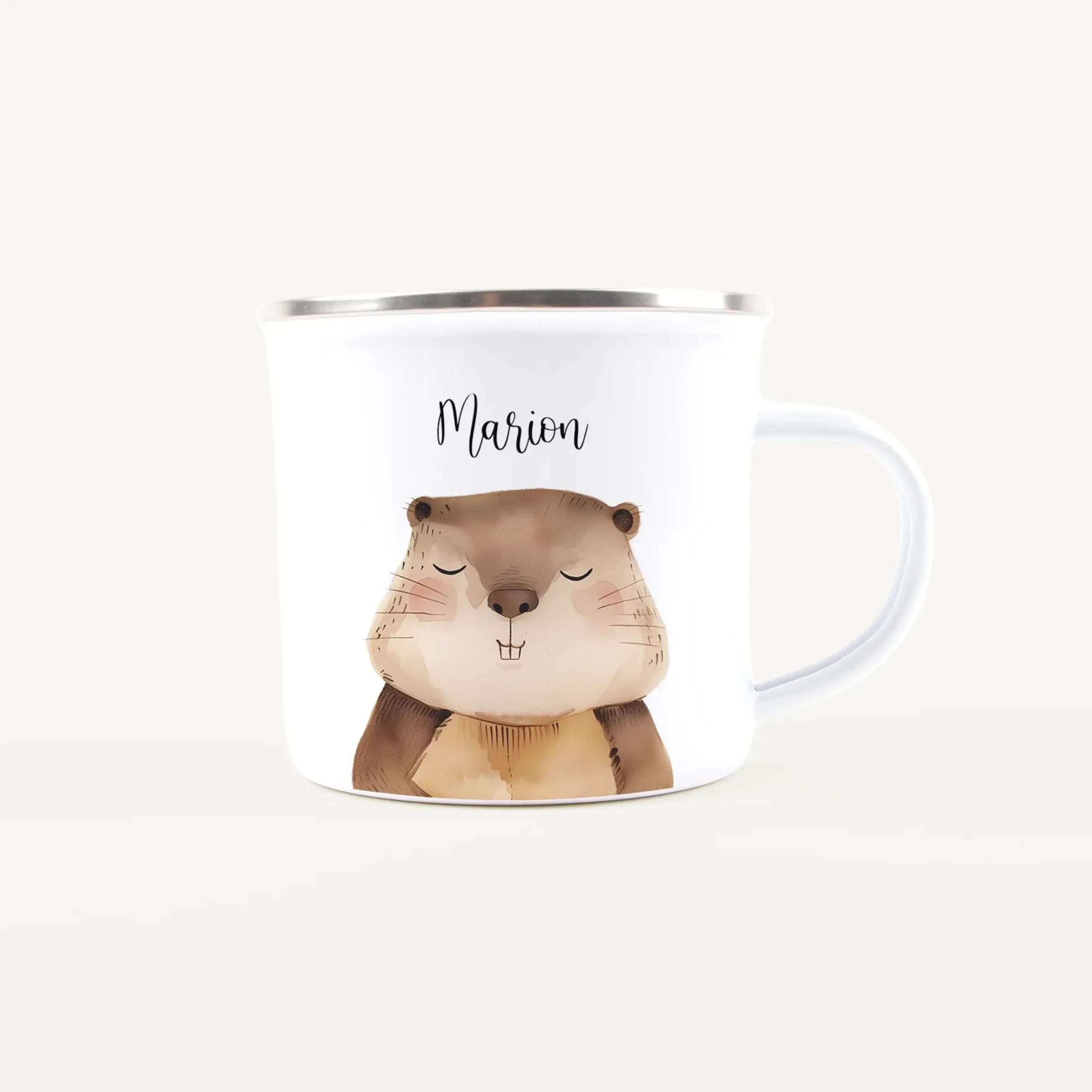 White ceramic mug with a sleepy brown bear illustration and the name 'Marion' on it.