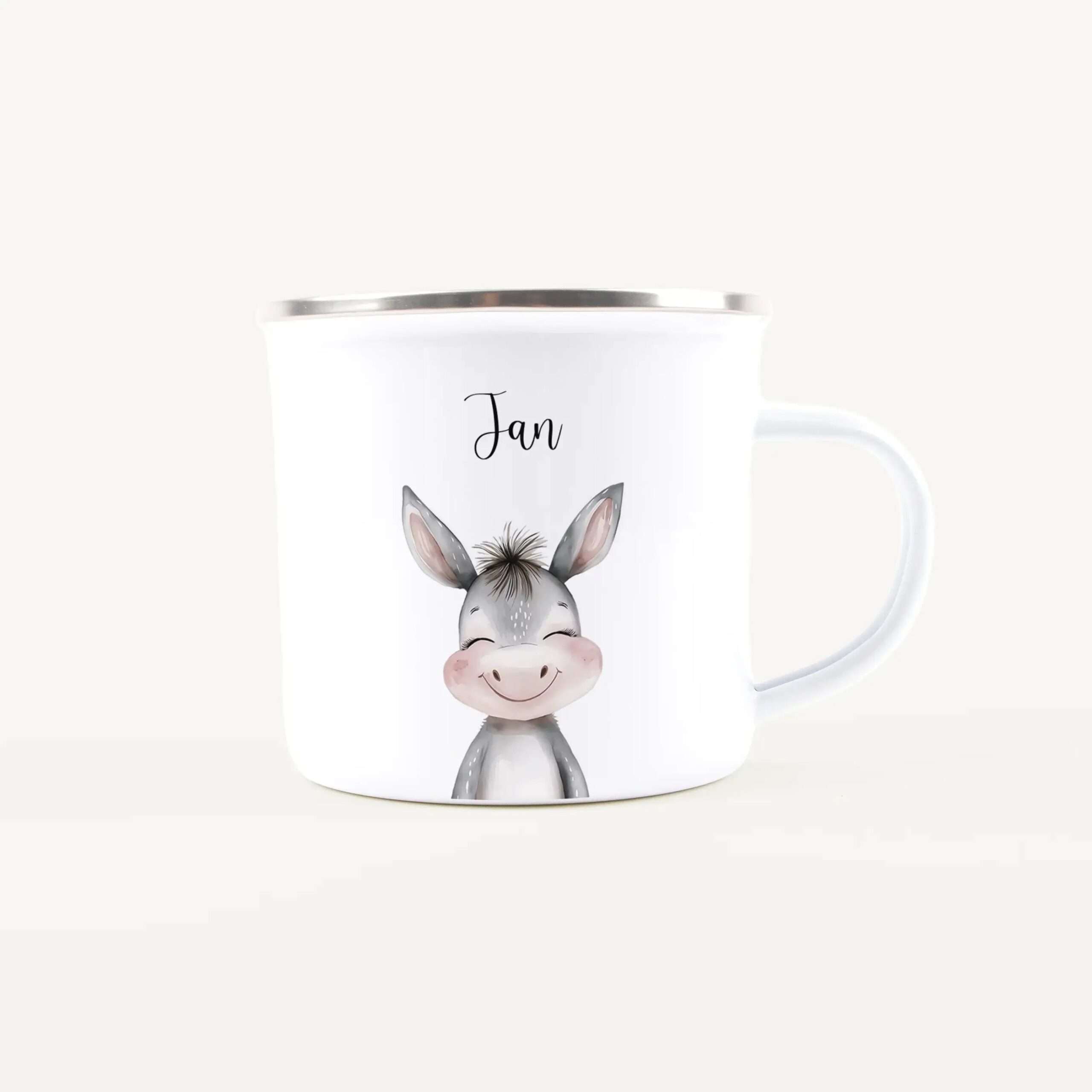 White ceramic mug with a cute gray donkey illustration and the name 'Jan' in script on its side, handle on the right.