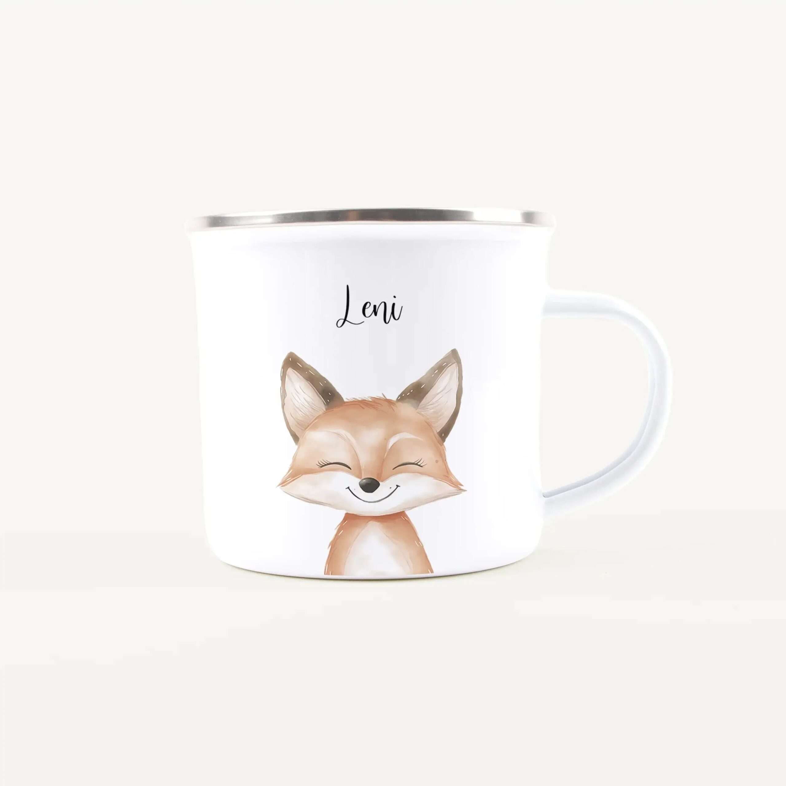White mug with a silver rim featuring a cute fox illustration on the front.