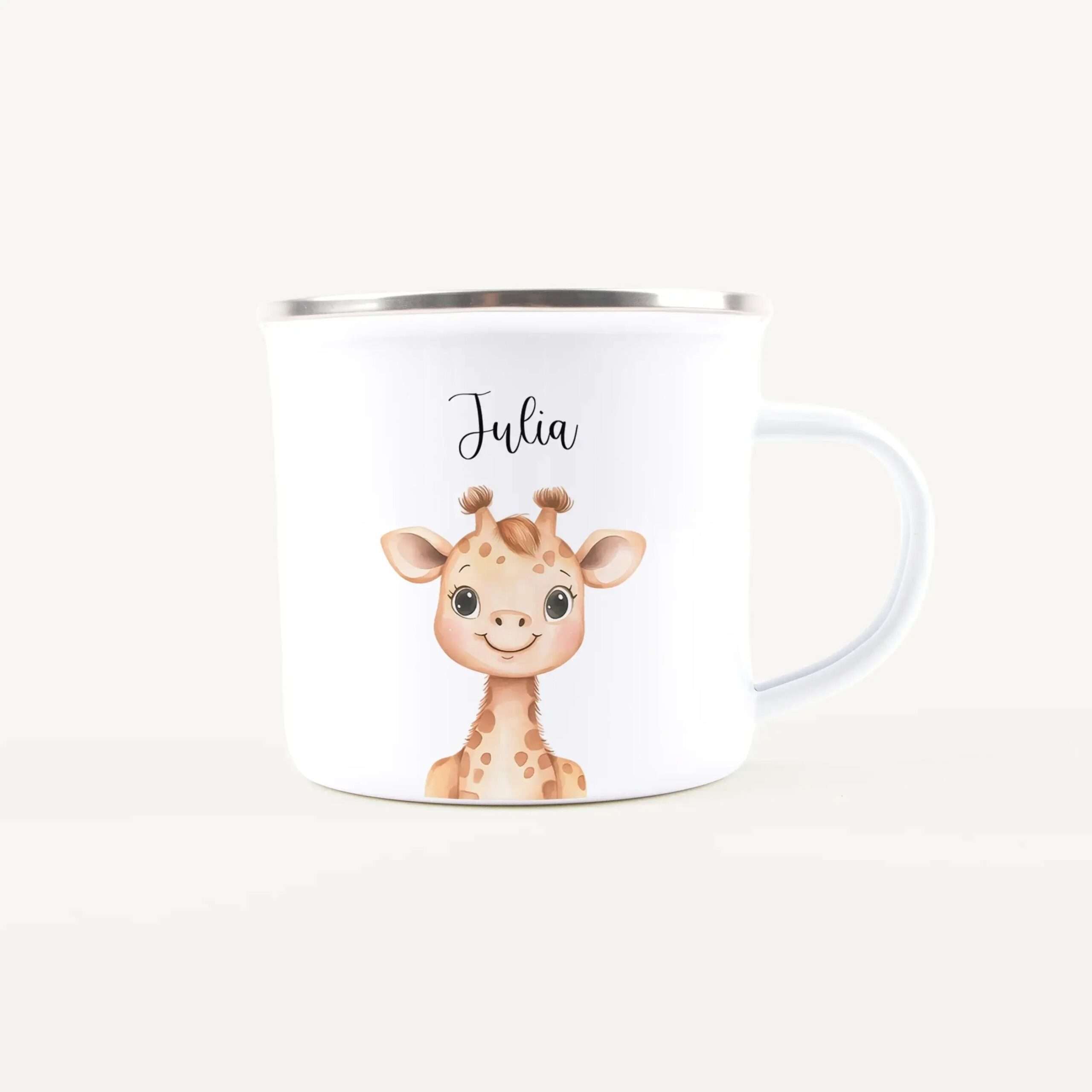 White ceramic mug featuring a cute cartoon giraffe and the name Julia printed on it.