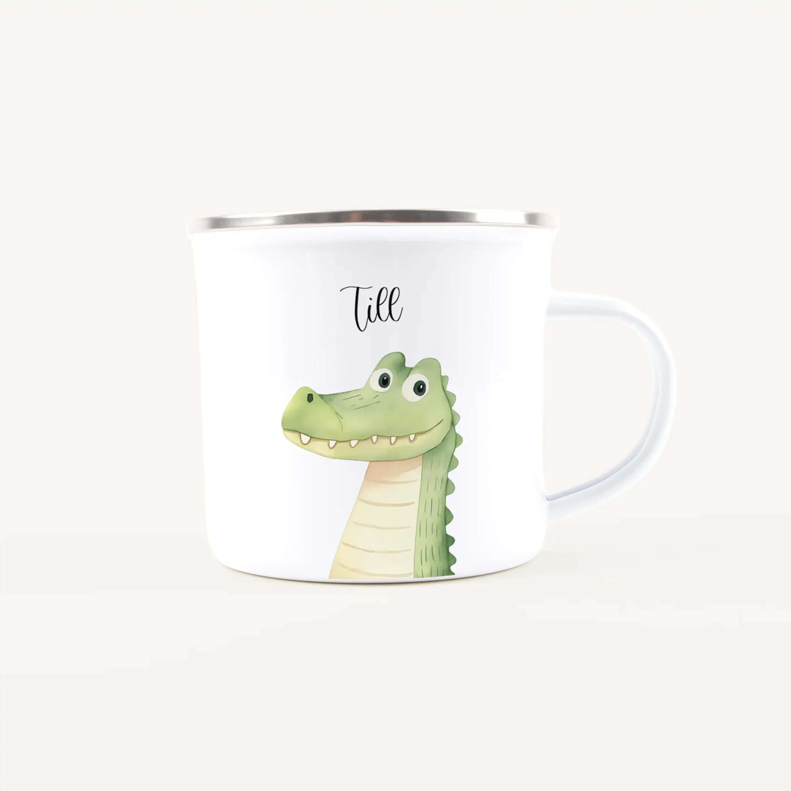 White mug with a playful green alligator illustration on the front.