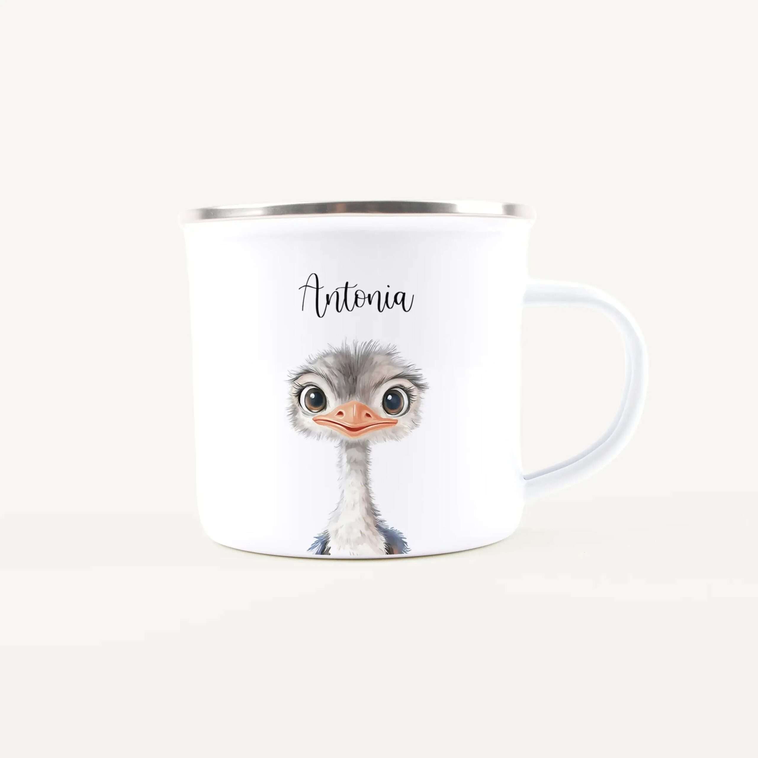 White ceramic mug featuring a cartoon ostrich and the name 'Antonia' on a pale background.