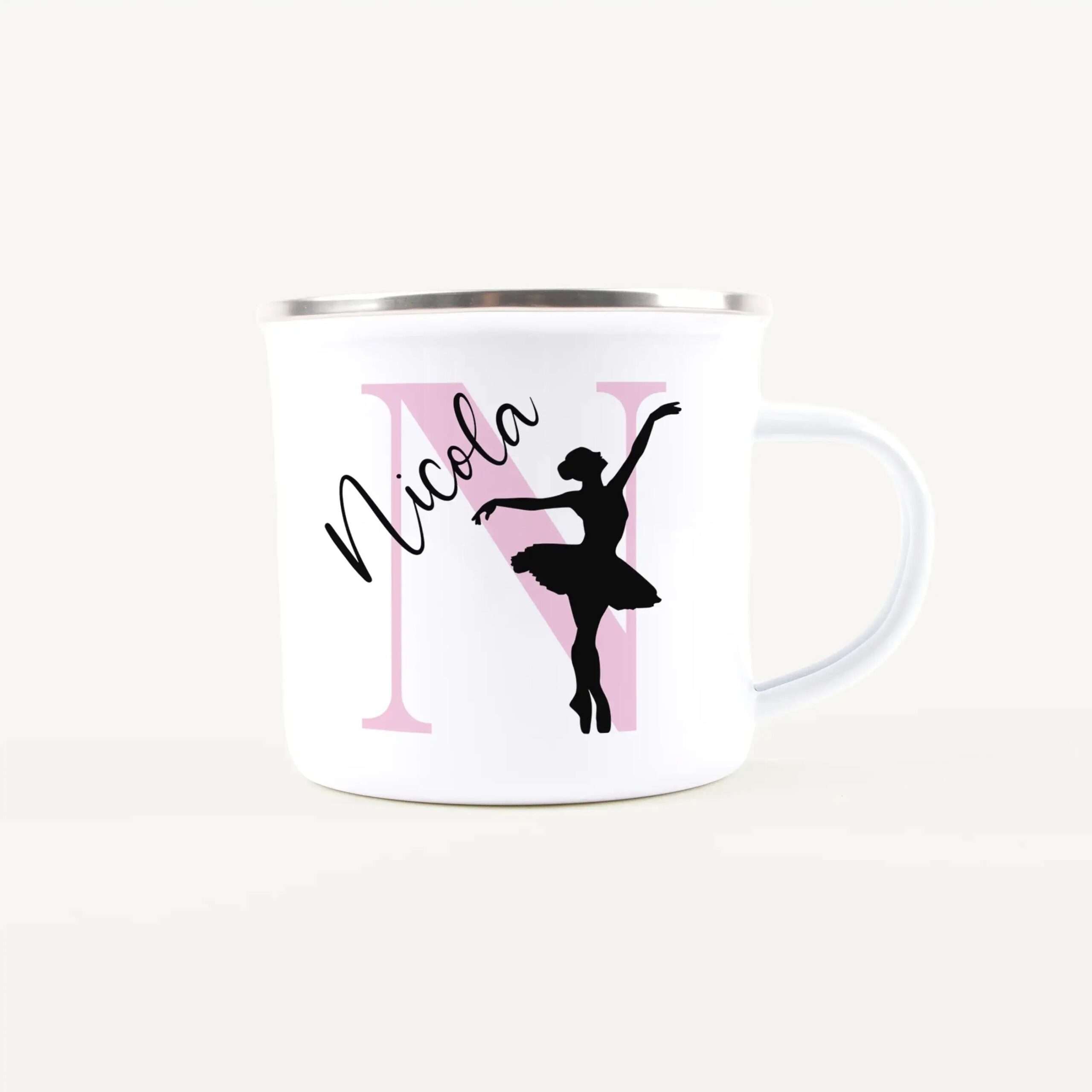 White mug featuring a black ballet dancer silhouette over pink geometric panels and cursive lettering, decorative design for a dancer theme.