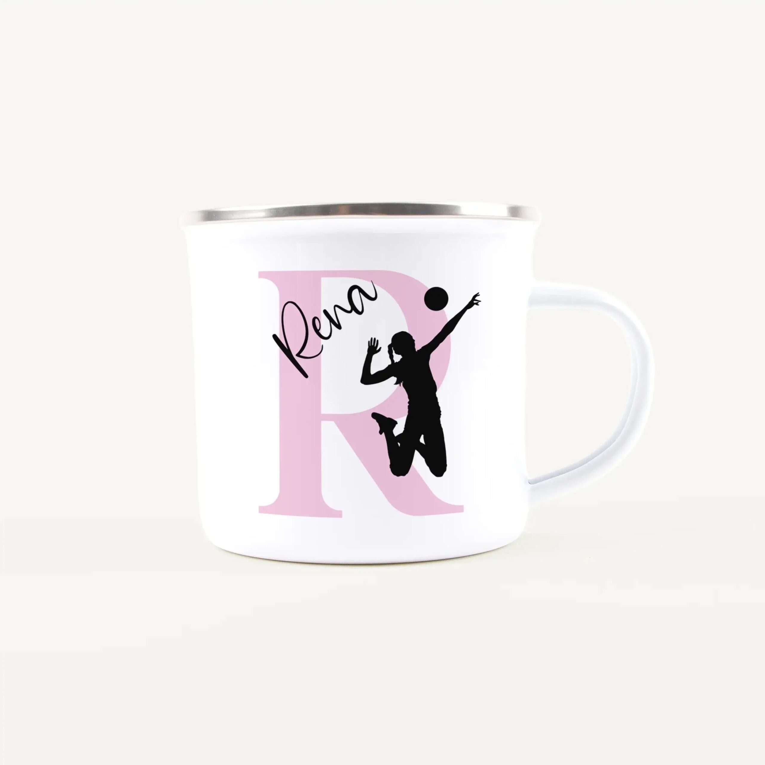 Mug featuring a large pink letter D with black silhouetted dancers posed inside and around the letter.