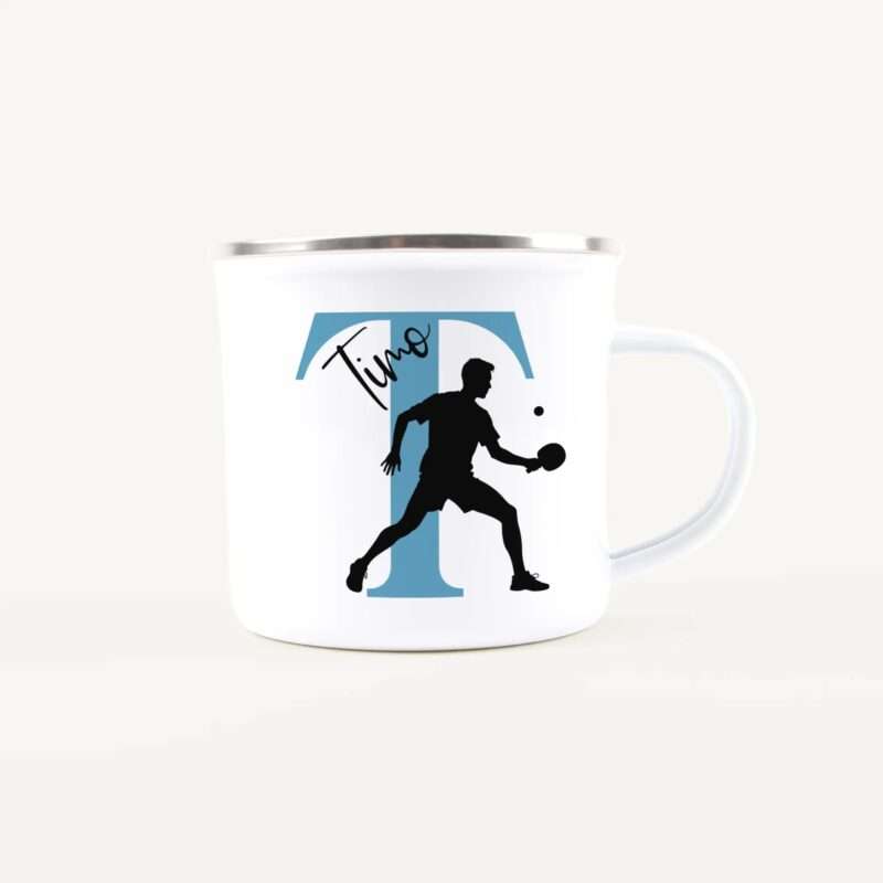 White mug featuring a graphic of a black silhouette playing soccer over a blue vertical panel.