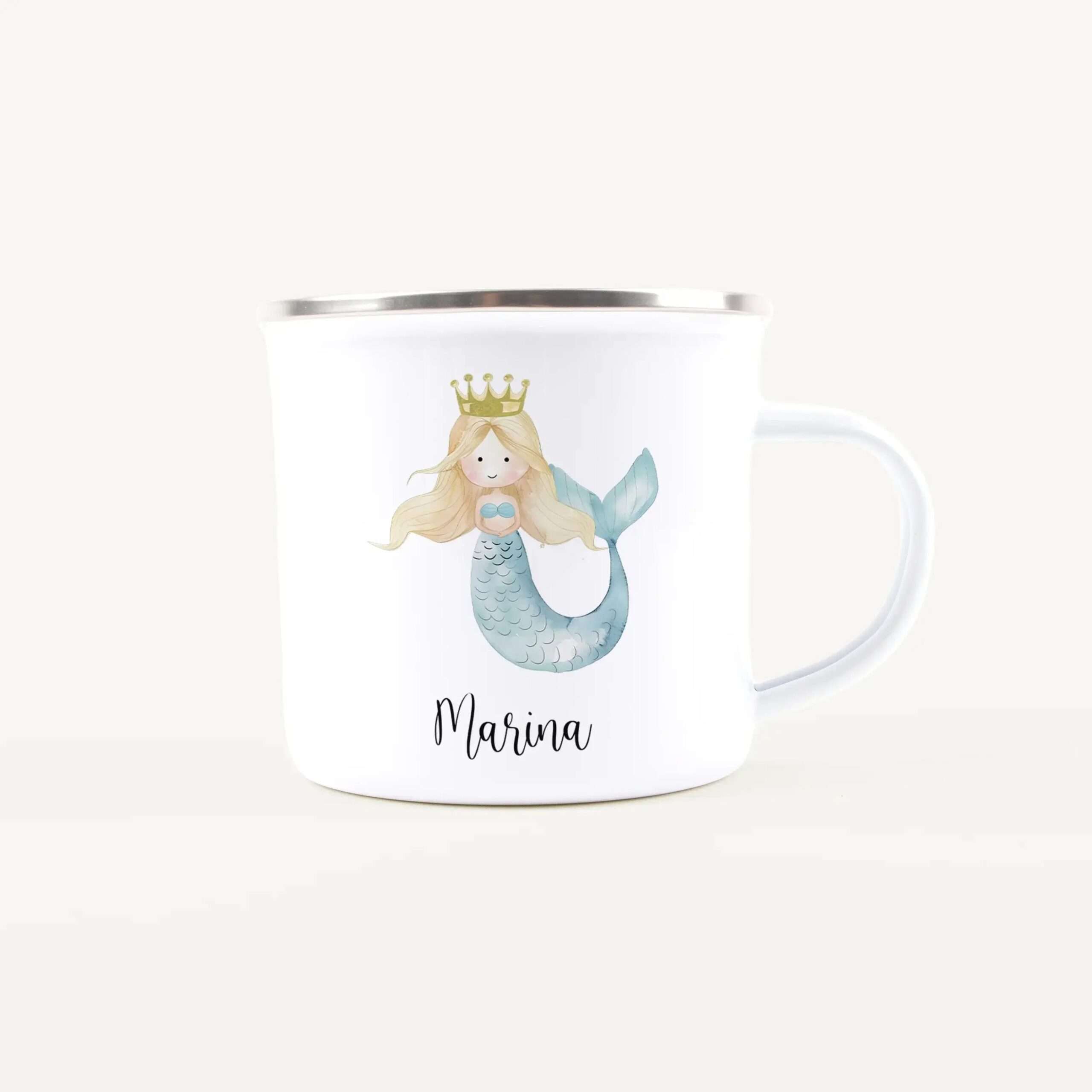 White ceramic mug featuring a pastel mermaid illustration and the name 'Marina' printed below.
