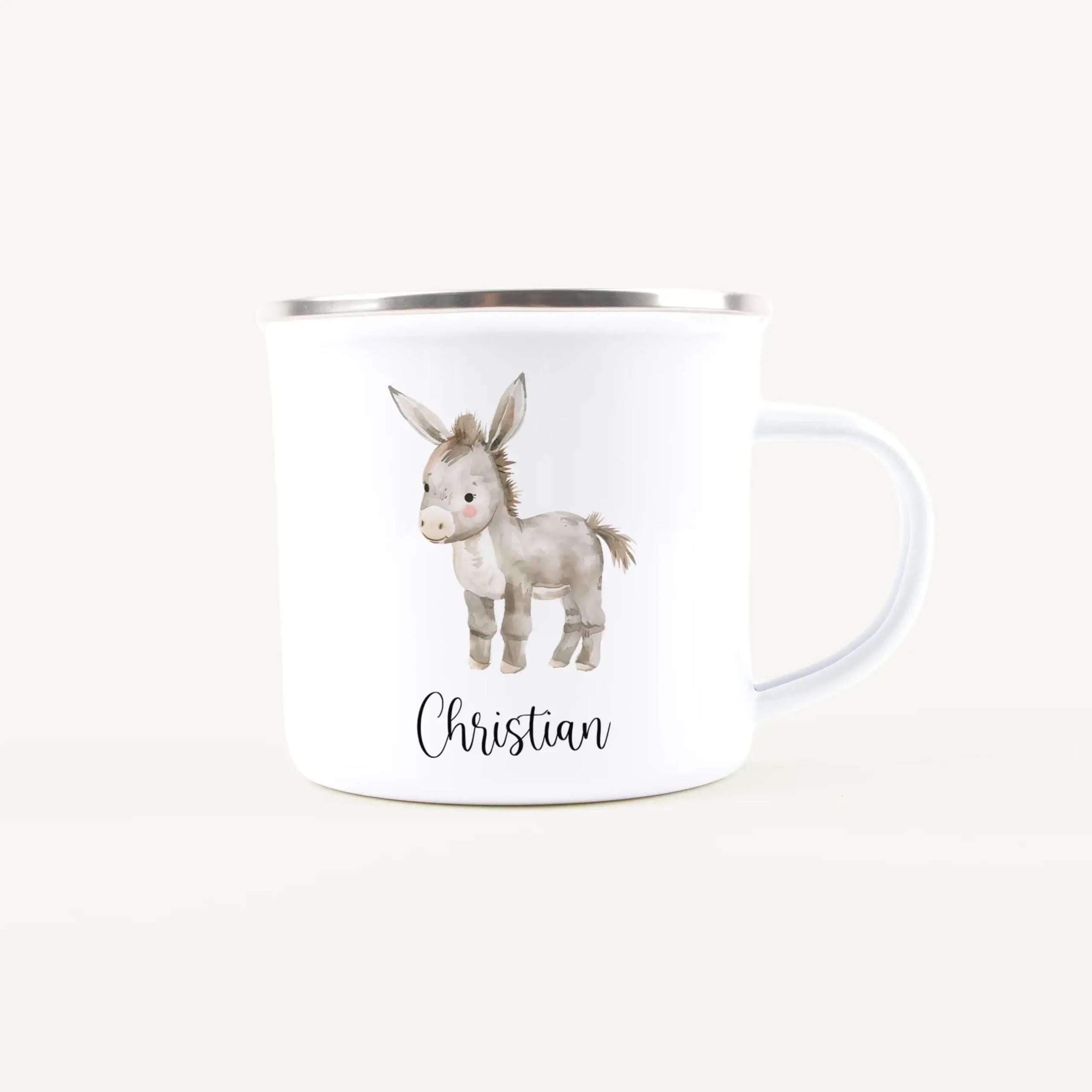 White mug with a watercolor bunny illustration and the name 'Christian' printed on it (partial view).