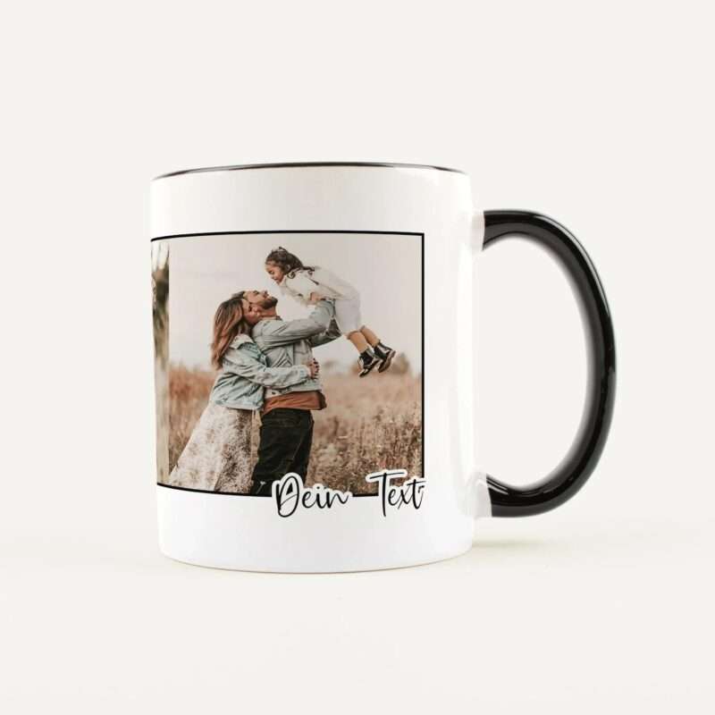 White ceramic mug with a family photo wrapped around it, showing parents lifting their child; includes placeholder text Dein Text at the bottom.