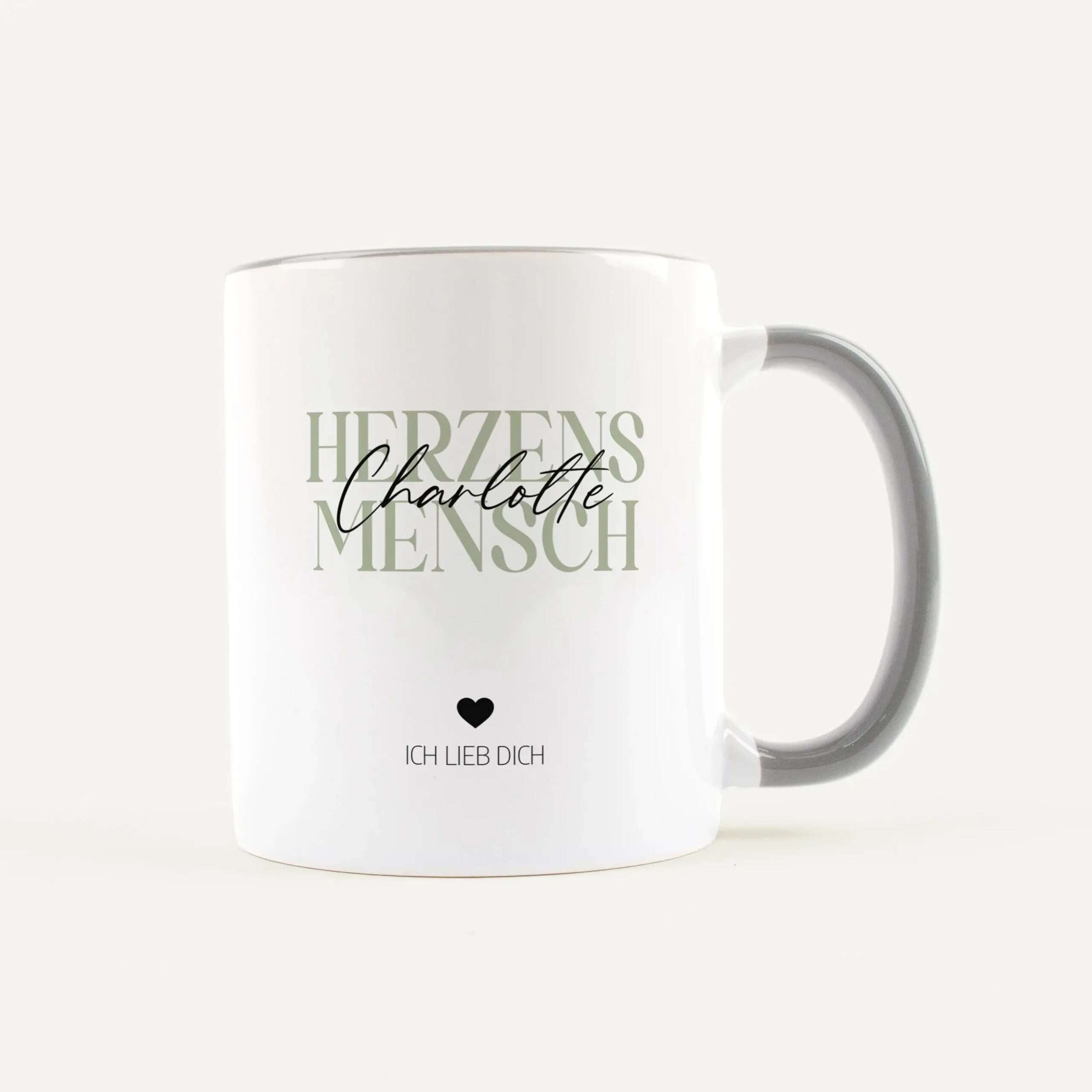 White ceramic mug showing 'Ich liebe dich' with a small heart motif on the front.