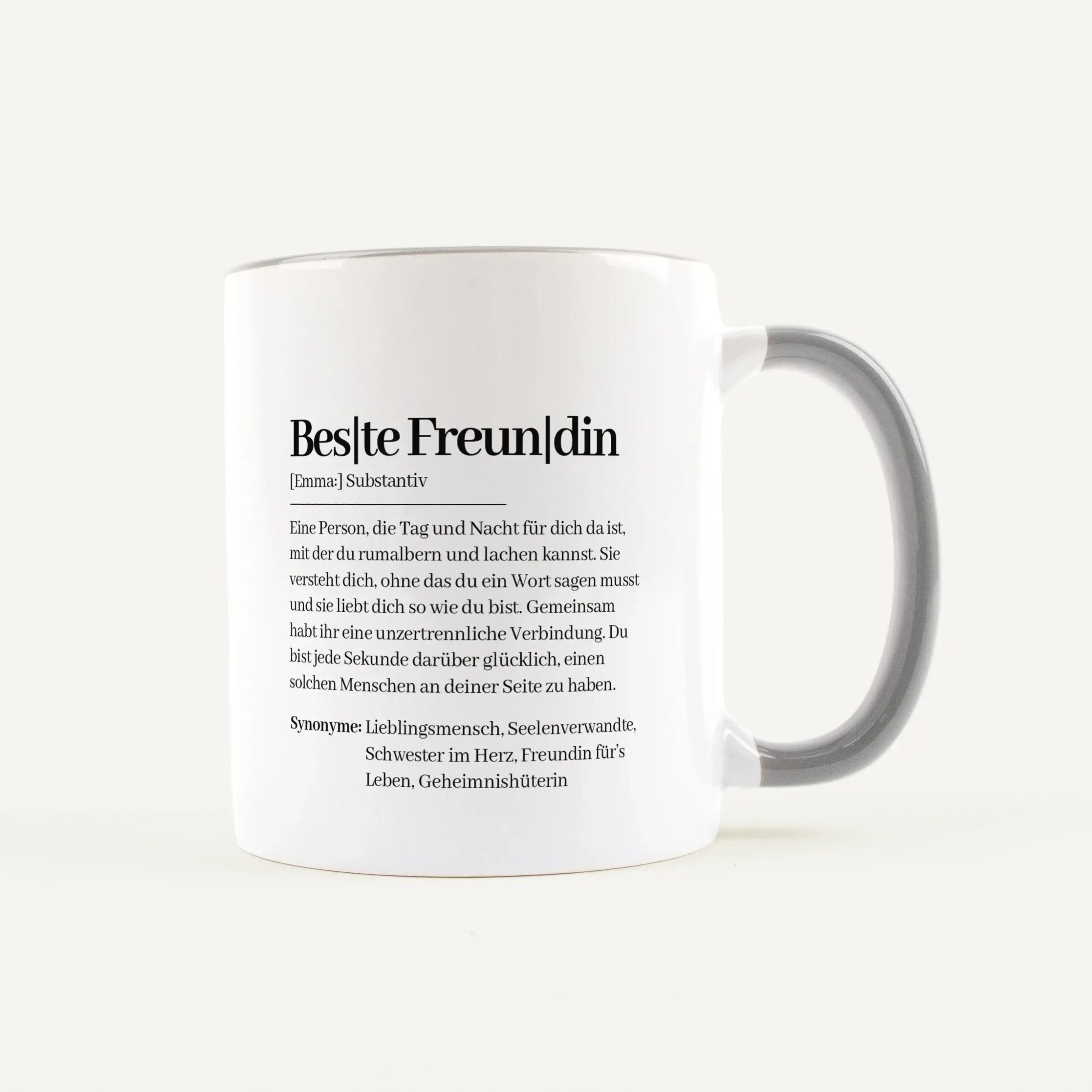 White ceramic mug with the German word 'Beste Freundin' and a dictionary-style definition printed on its surface.