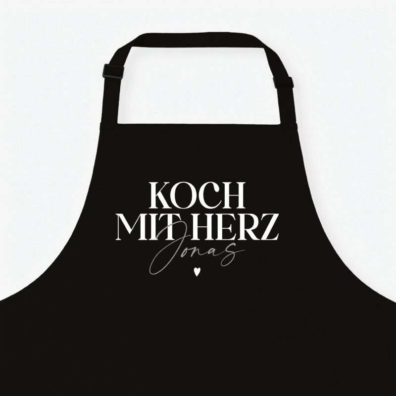 Silhouette of a black apron against a light background, with large white serif text and a small heart near the bottom.