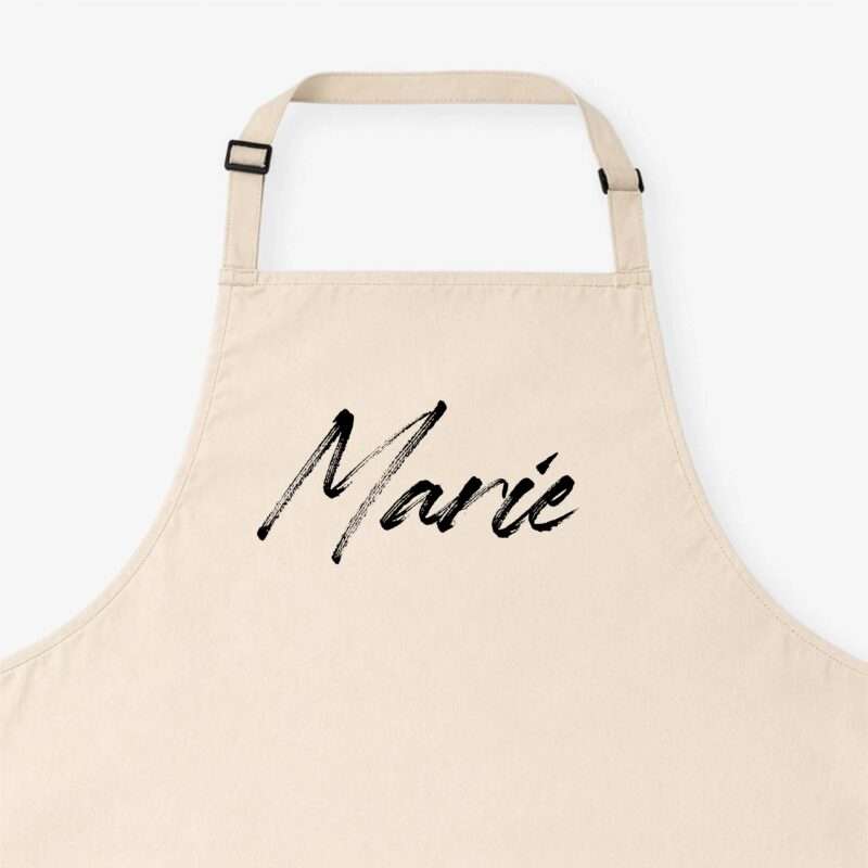 Bild von   kochschuerze mit namen beigejpg | Individuelle 🎁 persönliche 🎁 personalisierte Geschenke bedruckt ▪ bestickt ▪ graviert